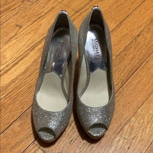 Michael Kors silver pumps